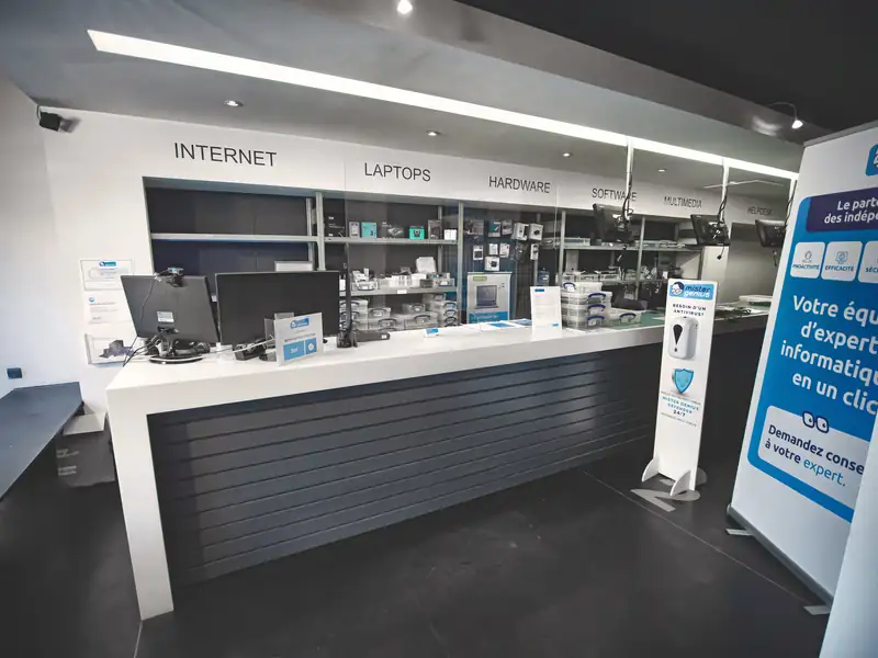 Counter and shelving at Mister Genius store, Jette