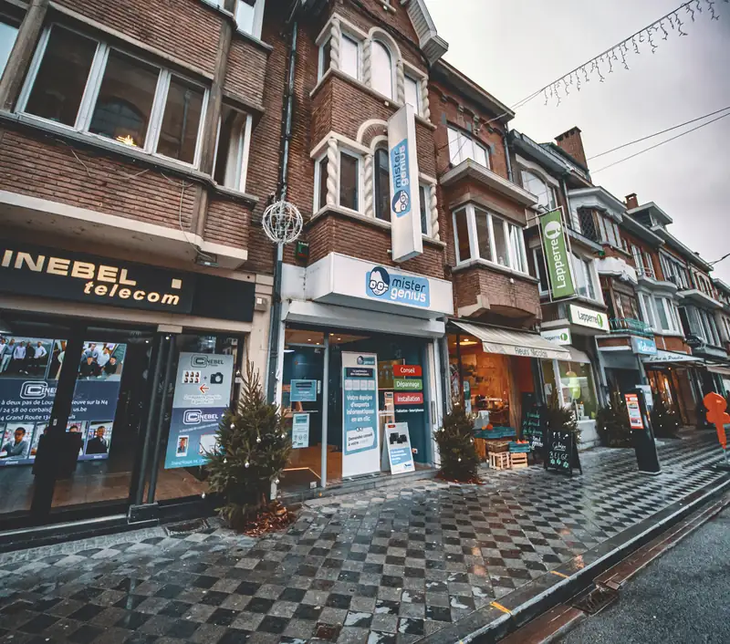 Shopping street in Wavre with Mister Genius display